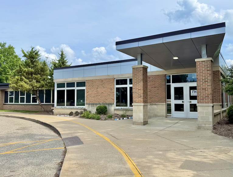 front of collins elementary building