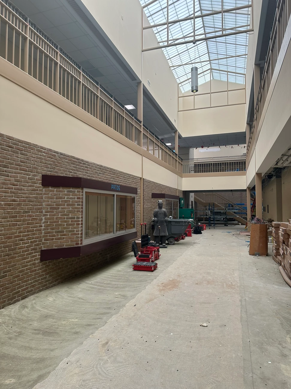 Construction progress inside a large hallway