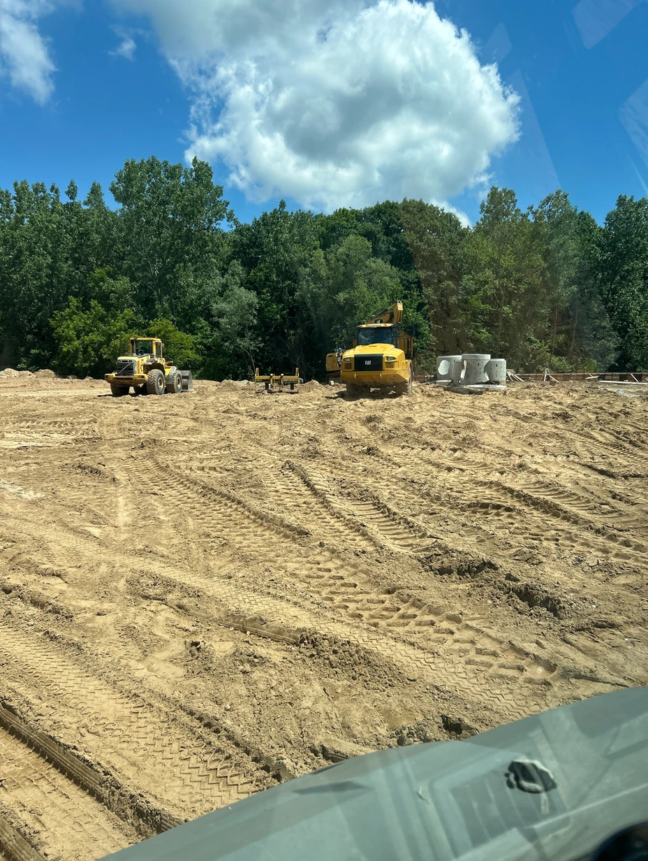 Construction progress outside with heavy machinery